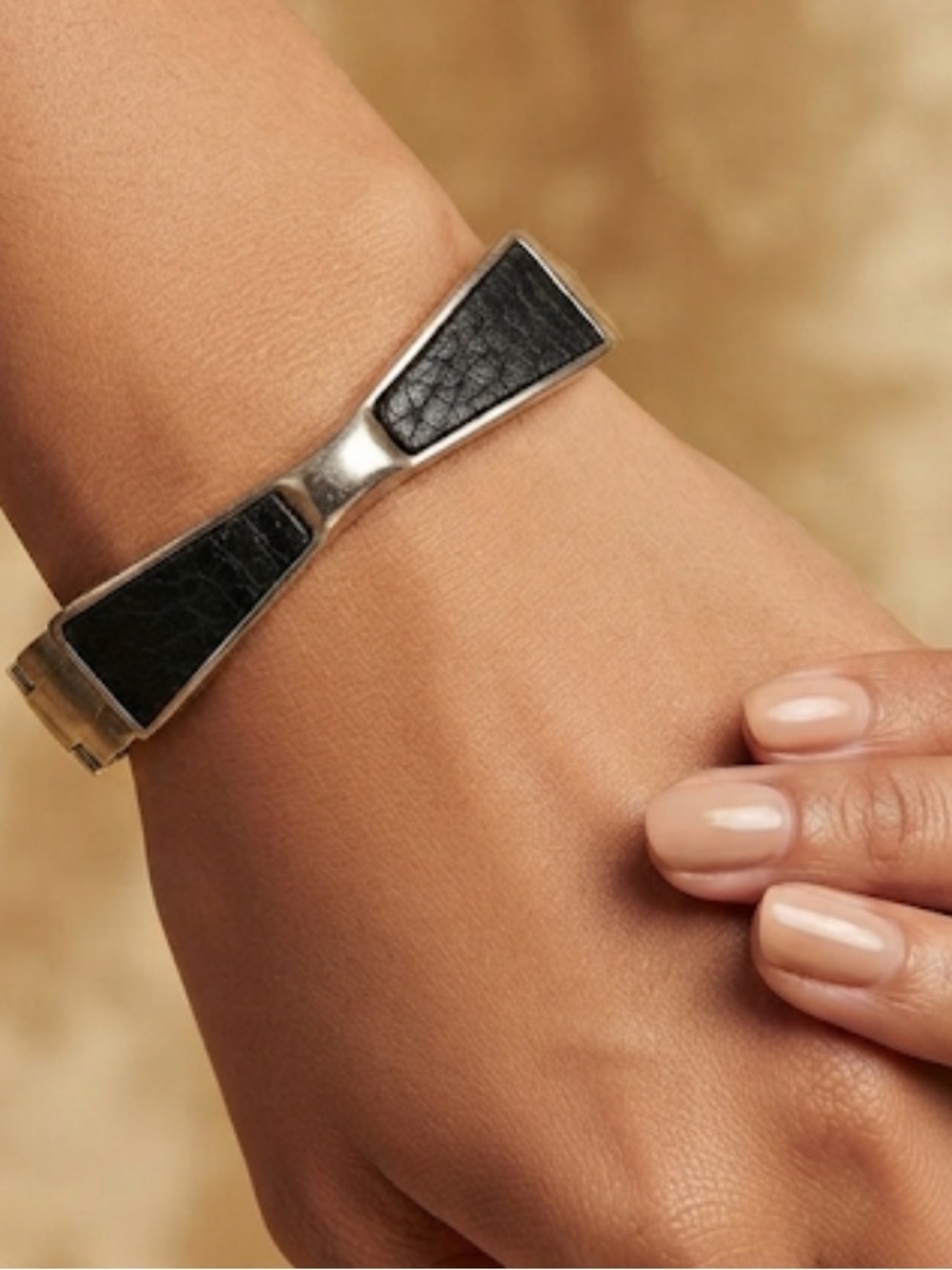 Gold Tone Bangle Bracelet with Black Inlay